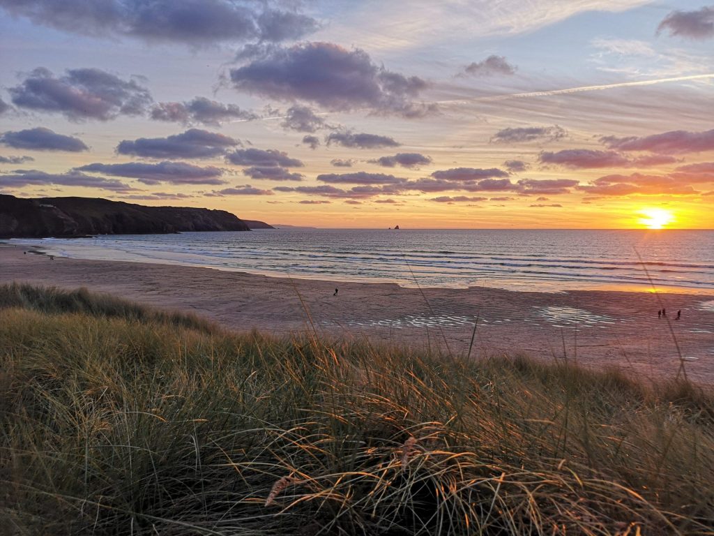 Perranporth beach in Cornwall at sunset